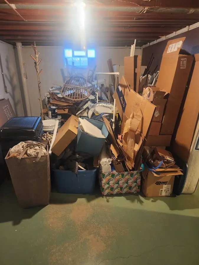 Roll-off dumpster container at job site for 2 Yard Dumpster Rental in Bloomsburg